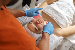 Skincare professional at Alladerm performing chemical peels treatment