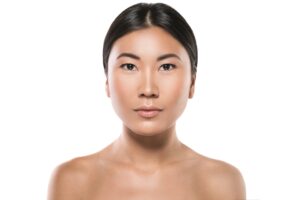 Patient at Alladerm medical spa in Aliso Viejo, CA receiving guidance on maintaining chin contour after Kybella