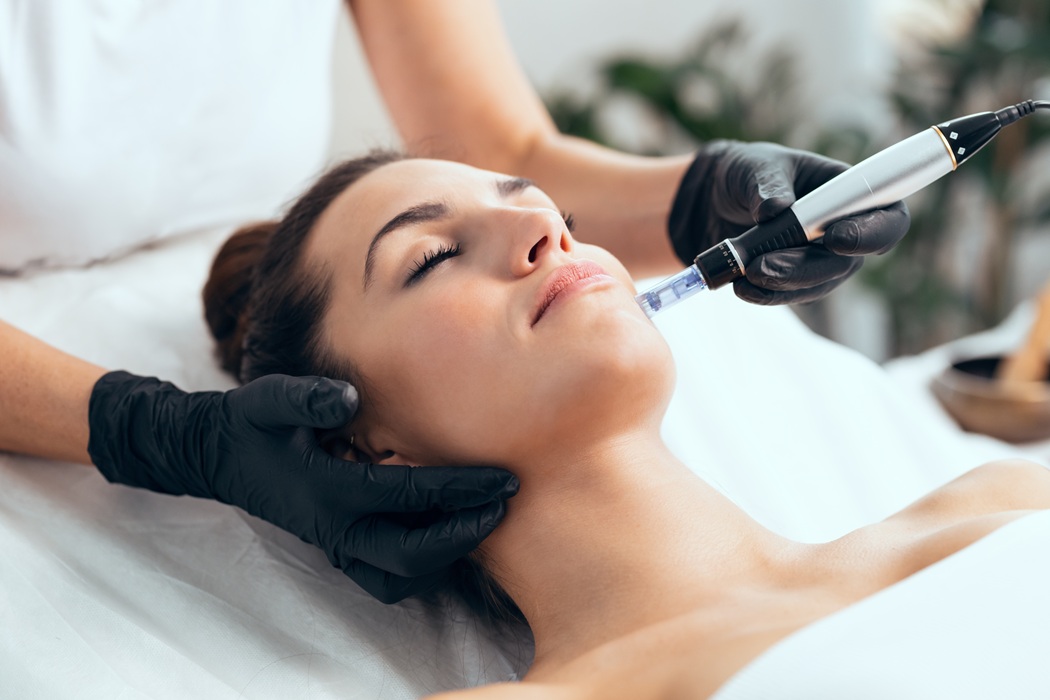 Licensed aesthetician performing microneedling for skin rejuvenation in Aliso Viejo, CA